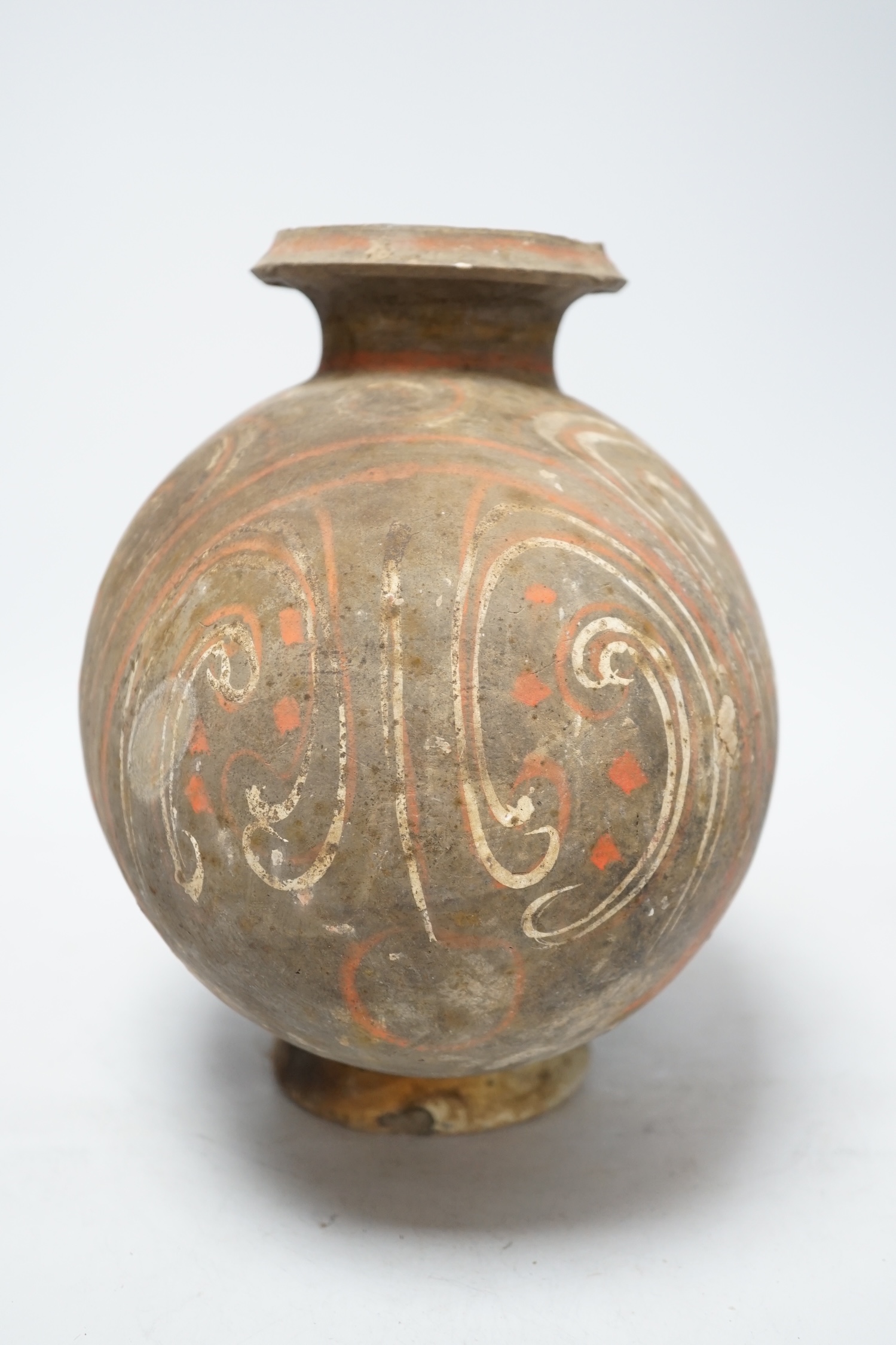 A Chinese pigment painted 'cocoon' jar, Han dynasty, 26cm high